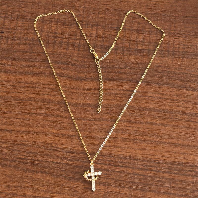 cross necklace with rotatable crown